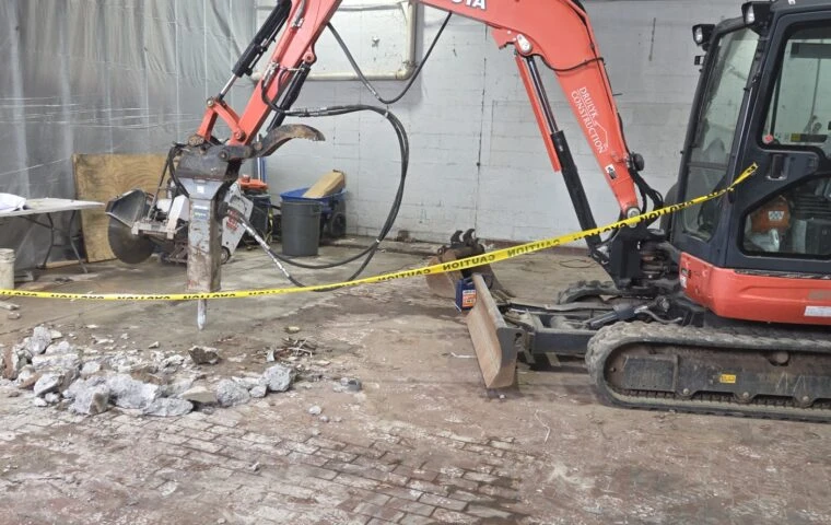 Temporary Protection Complete. Concrete Demolition Underway at Canastota Dairy.